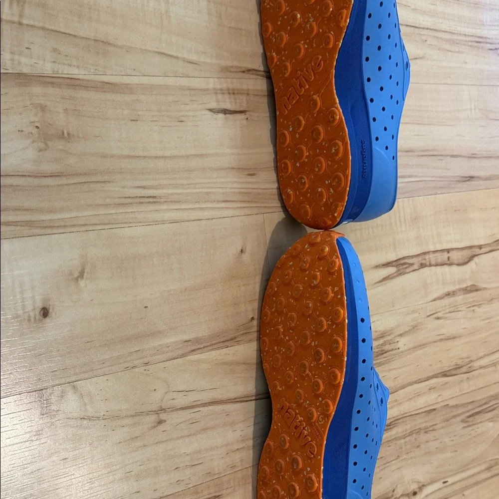 Native Blue Kids Slip-On Water Shoes with Orange Accents